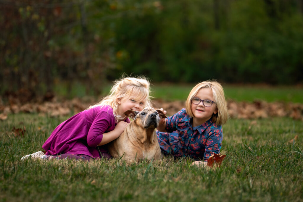 two girls with their dog
