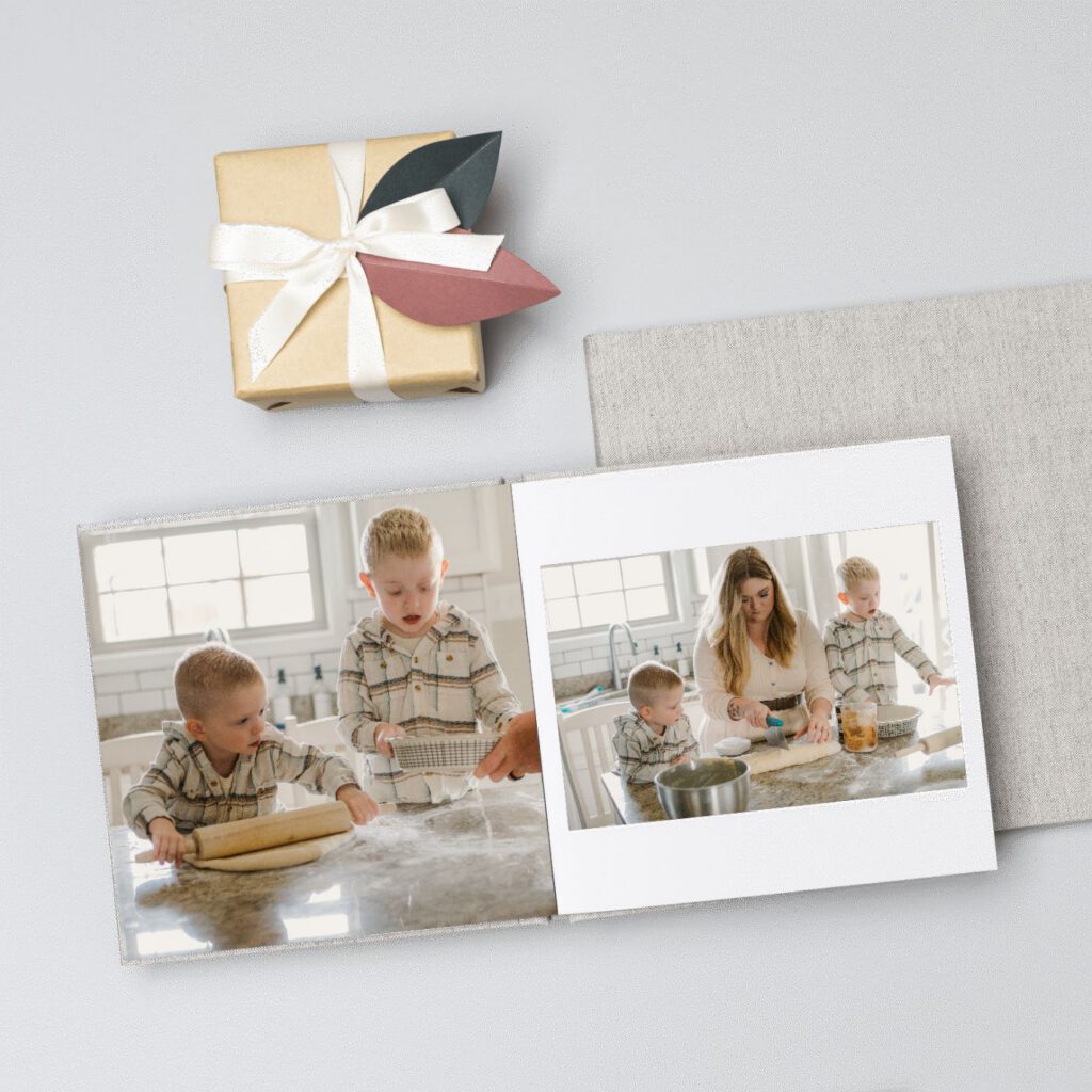 an album open displaying images of a family baking in their kitchen